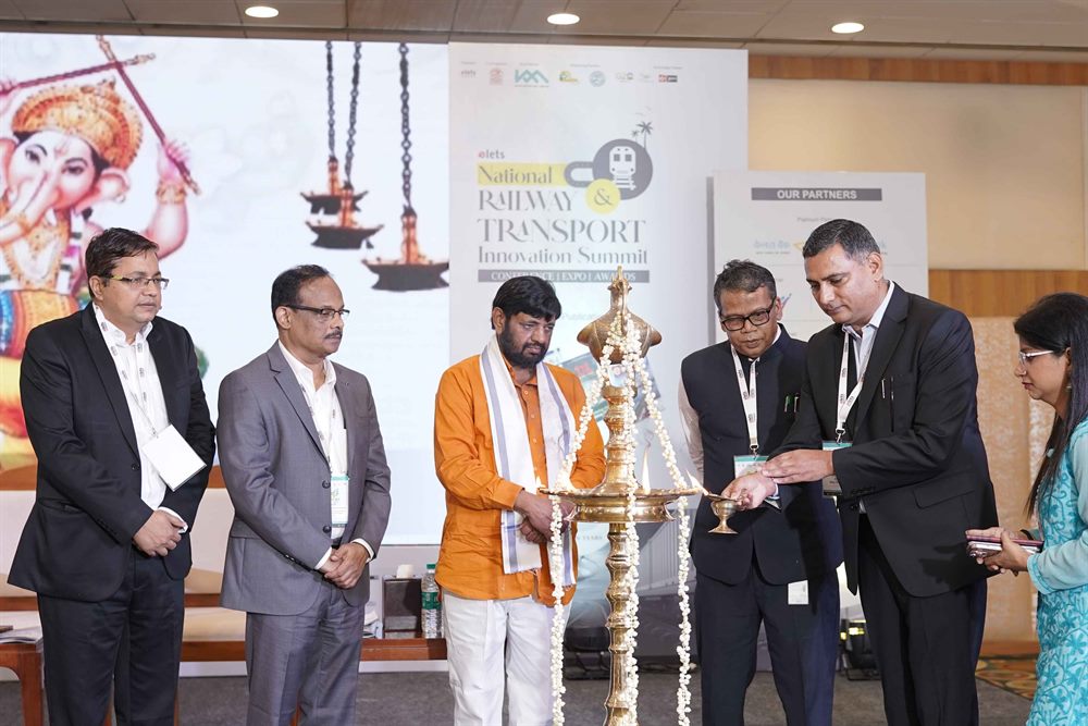Dignitaries lighting the ceremonial lamp